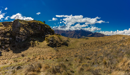 Rocky Mountain and Diamond Lake in the Mt Aspiring National Park near Wanaka, New Zealandの写真素材