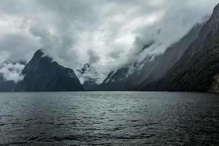 Cloudy and rainy day at amazing and vibrant Milford Sound, South Island, New Zealandの写真素材