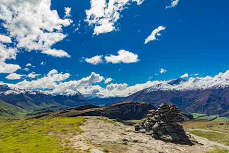 Rocky Mountain and Diamond Lake in the Mt Aspiring National Park near Wanaka, New Zealandの写真素材