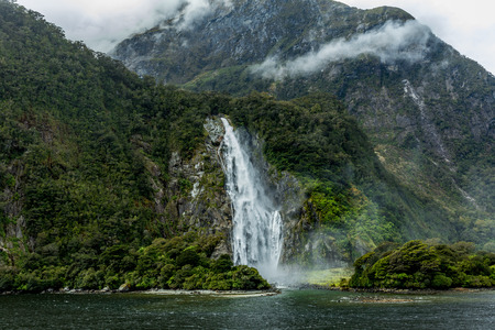 Cloudy and rainy day at amazing and vibrant Milford Sound, South Island, New Zealandの写真素材