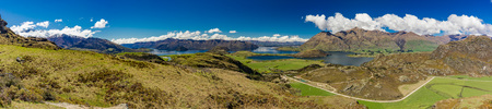 Rocky Mountain and Diamond Lake in the Mt Aspiring National Park near Wanaka, New Zealandの写真素材