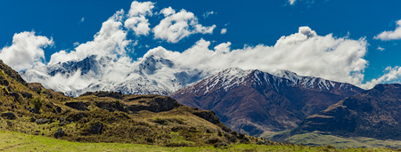 Rocky Mountain and Diamond Lake in the Mt Aspiring National Park near Wanaka, New Zealandの写真素材