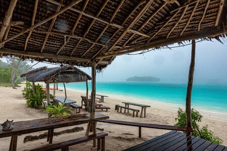 Amazing Port Orly sandy beach with palm trees, Espiritu Santo Island, Vanuatu.の写真素材