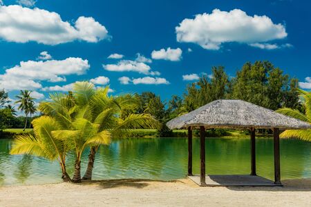 Tropical resort destination in Port Vila, Efate Island, Vanuatu, with beach and palm treesの写真素材