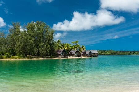 Tropical resort destination in Port Vila, Efate Island, Vanuatu, with beach and palm treesの写真素材
