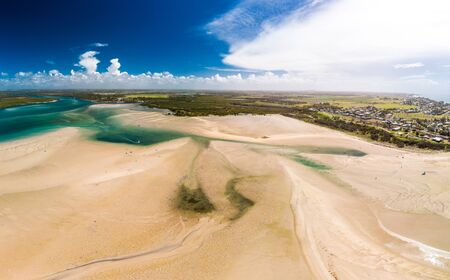 Drone aerial view of Elliott Heads Beach and River, Queensland, Australiaの写真素材