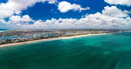 Drone view of famous Mooloolaba beach and marina on sunny dayの写真素材