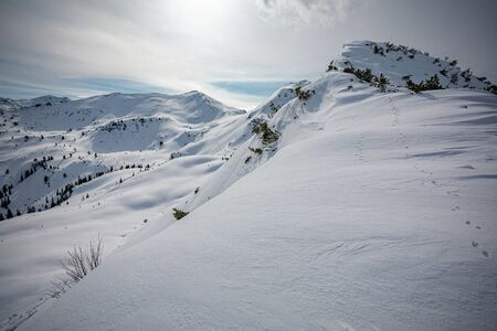 Snowy peaks, Planneralm skiing resort in winter,  Austrian Alpsの写真素材