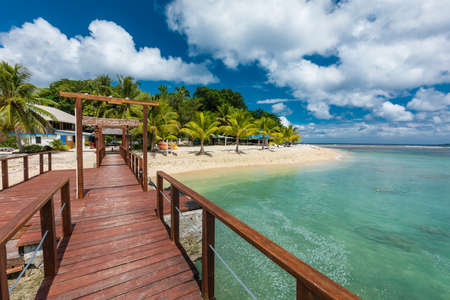 Port Vila, Vanuatu - April 6 2019: Jetty of a tropical Hideaway Island, Vanuatu, Port Vila, popular holidaymakers island for snorkeling. Close to Efate Island.のeditorial素材