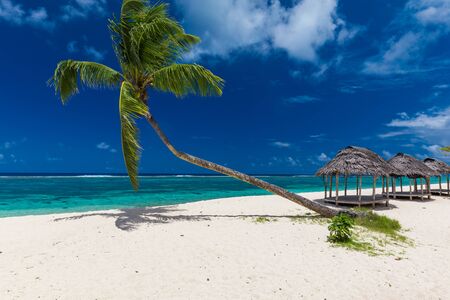 Lalomanu beach with open huts called fales, south side of Upolu Island, Samoa.の写真素材