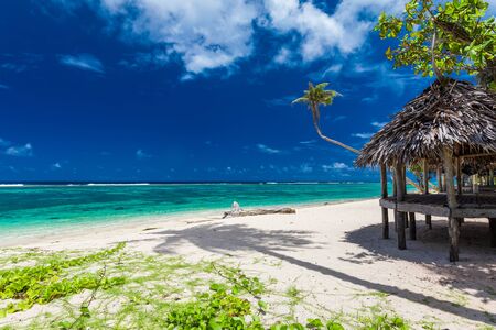 Lalomanu beach with open huts called fales, south side of Upolu Island, Samoa.の写真素材