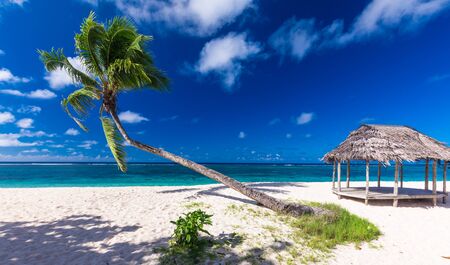 Lalomanu beach with open huts called fales, south side of Upolu Island, Samoa.の写真素材