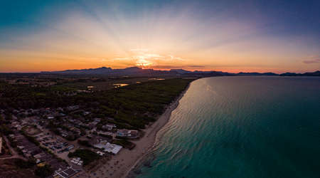 Aerial drone view of a coast line with beach in playa de Muro, Mallorca, Spainの写真素材