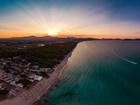 Aerial drone view of a coast line with beach in playa de Muro, Mallorca, Spainの写真素材
