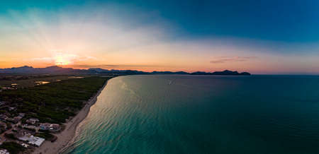 Aerial drone view of a coast line with beach in playa de Muro, Mallorca, Spainの写真素材