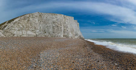 Severn Sisters white cliffs over the ocean at Cuckmere, in the South Downs National Park, East Sussex, UKの写真素材