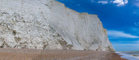 Severn Sisters white cliffs over the ocean at Cuckmere, in the South Downs National Park, East Sussex, UKの写真素材