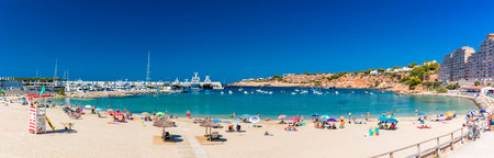 PORT ADRIANO, MALLORCA, SPAIN - 23 July 2020 - Tourists enjoying summer day on the popular city beach.のeditorial素材
