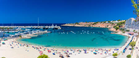 PORT ADRIANO, MALLORCA, SPAIN - 23 July 2020 - Tourists enjoying summer day on the popular city beach.のeditorial素材