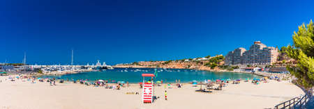 PORT ADRIANO, MALLORCA, SPAIN - 23 July 2020 - Tourists enjoying summer day on the popular city beach.のeditorial素材