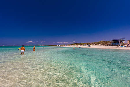 ES TRENC, Majorca, Spain - 25 JULY 2020 - People enjoying summer day on tourist hotspot beach in Majorka.のeditorial素材