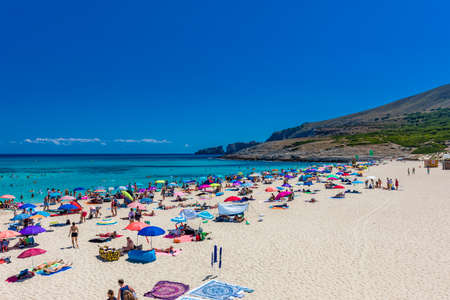 CALA MESQUIDA, MALLORCA, SPAIN - 19 July 2020: People enjoying beautiful sandy beach of on Mallorca, Mediterranean Sea, Balearic islands, Spain.のeditorial素材