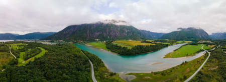 Wonderful aerial drone view of Rauma river, mountains and Andalsnes cityの写真素材