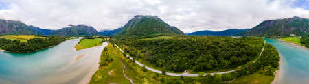 Wonderful aerial drone view of Rauma river, mountains and Andalsnes cityの写真素材