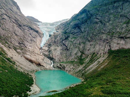 Briksdalsbreen is a glacier arm of Jostedalsbreen, and a lake, Briksdalsbre, Norwayの写真素材