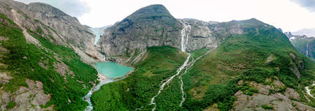 Briksdalsbreen is a glacier arm of Jostedalsbreen, and a lake, Briksdalsbre, Norwayの写真素材