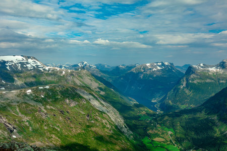 Panoramic view of Geirangerfjord and mountains landscape from the Dalsnibba Plateau viewpoint,...