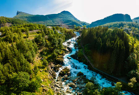 Panoramic iew of the river Geirangerelvi and the waterfall Storfossen in Geiranger, Norway.の写真素材