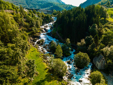 Panoramic iew of the river Geirangerelvi and the waterfall Storfossen in Geiranger, Norway.の写真素材