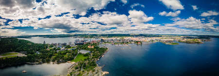 Drone view of Kristiansand town and Kvadraturen from Oderoya, Norwayの写真素材
