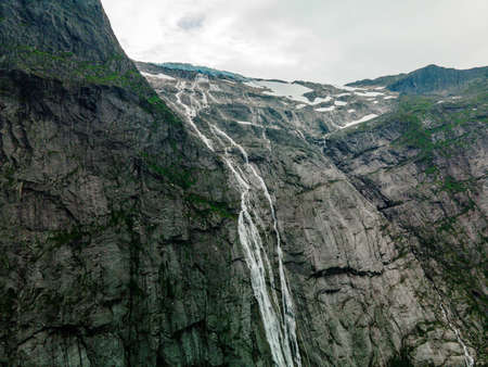 Briksdalsbreen is a glacier arm of Jostedalsbreen, and a lake, Briksdalsbre, Norwayの写真素材