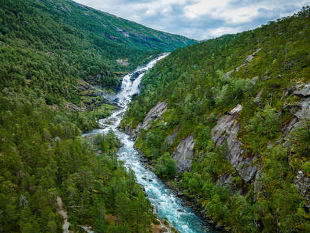 Nyastolfossen falls, the second in cascade of four waterfalls in Husedalen valley, Kinsarvik, Norwayの写真素材