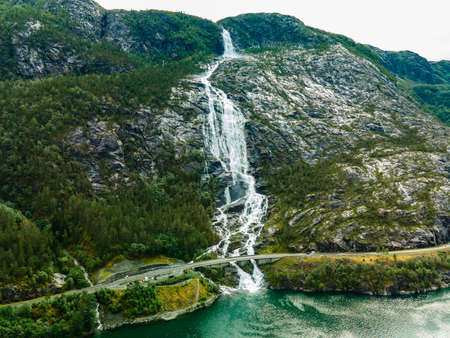 With a total drop of 612 metres, Langfoss (Langfossen) is the fifth highest waterfall in Norway.の写真素材