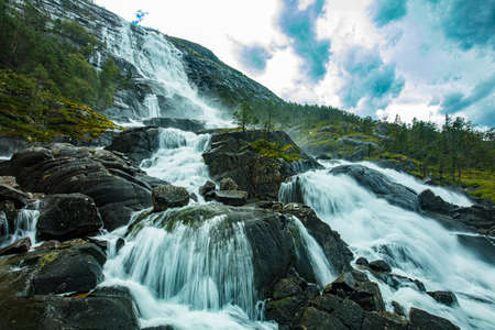With a total drop of 612 metres, Langfoss (Langfossen) is the fifth highest waterfall in Norway.の写真素材