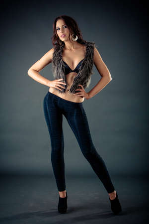 Elegant fashionable woman in black lingerie in studio, high fashionの写真素材