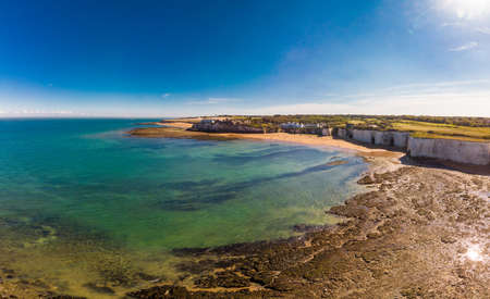 Drone aerial view of the beach and white cliffs on sunny day, Margate, England, UKの写真素材