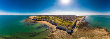 Drone aerial view of the beach and white cliffs on sunny day, Margate, England, UKの写真素材