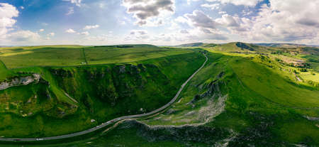 Drone view of Winnats Pass, Peak District National Park, Derbyshire, England, UKの写真素材