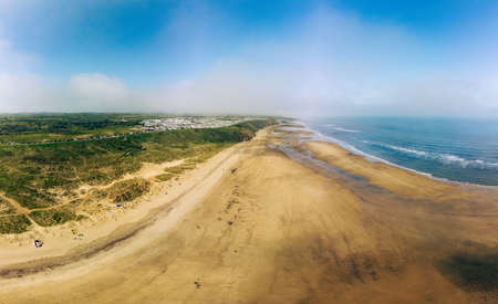 Sunny Cliffs and beach at Blackhall Rocks and Cromdon Dene Beachの写真素材