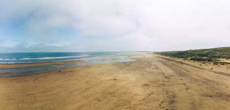 Sunny Cliffs and beach at Blackhall Rocks and Cromdon Dene Beachの写真素材