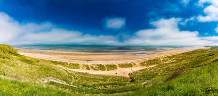 Sunny Cliffs and beach at Blackhall Rocks and Cromdon Dene Beachの写真素材