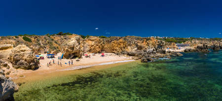 Aerial panoramic view of amazing Praia dos Paradinha beach, Albufeira, Algarve, Portugalの写真素材