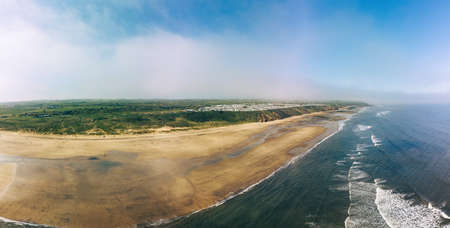 Sunny Cliffs and beach at Blackhall Rocks and Cromdon Dene Beachの写真素材