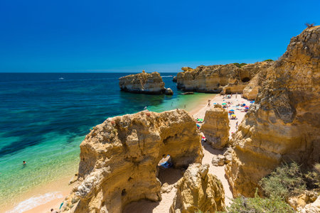 Aerial panoramic view of amazing Praia dos Paradinha beach, Albufeira, Algarve, Portugalの写真素材