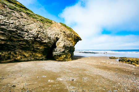 Sunny Cliffs and beach at Blackhall Rocks and Cromdon Dene Beachの写真素材