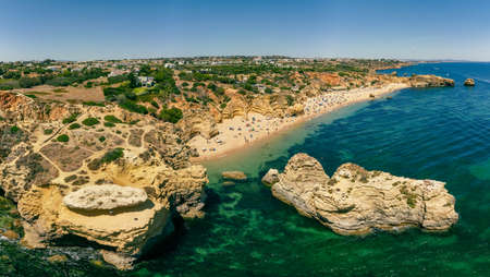 Aerial panoramic view of amazing Praia dos Paradinha beach, Albufeira, Algarve, Portugalの写真素材